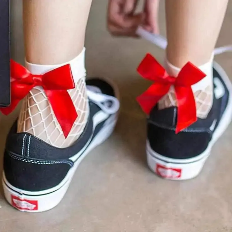 Chic Flair Bowtie Fishnet Socks Showcase Style