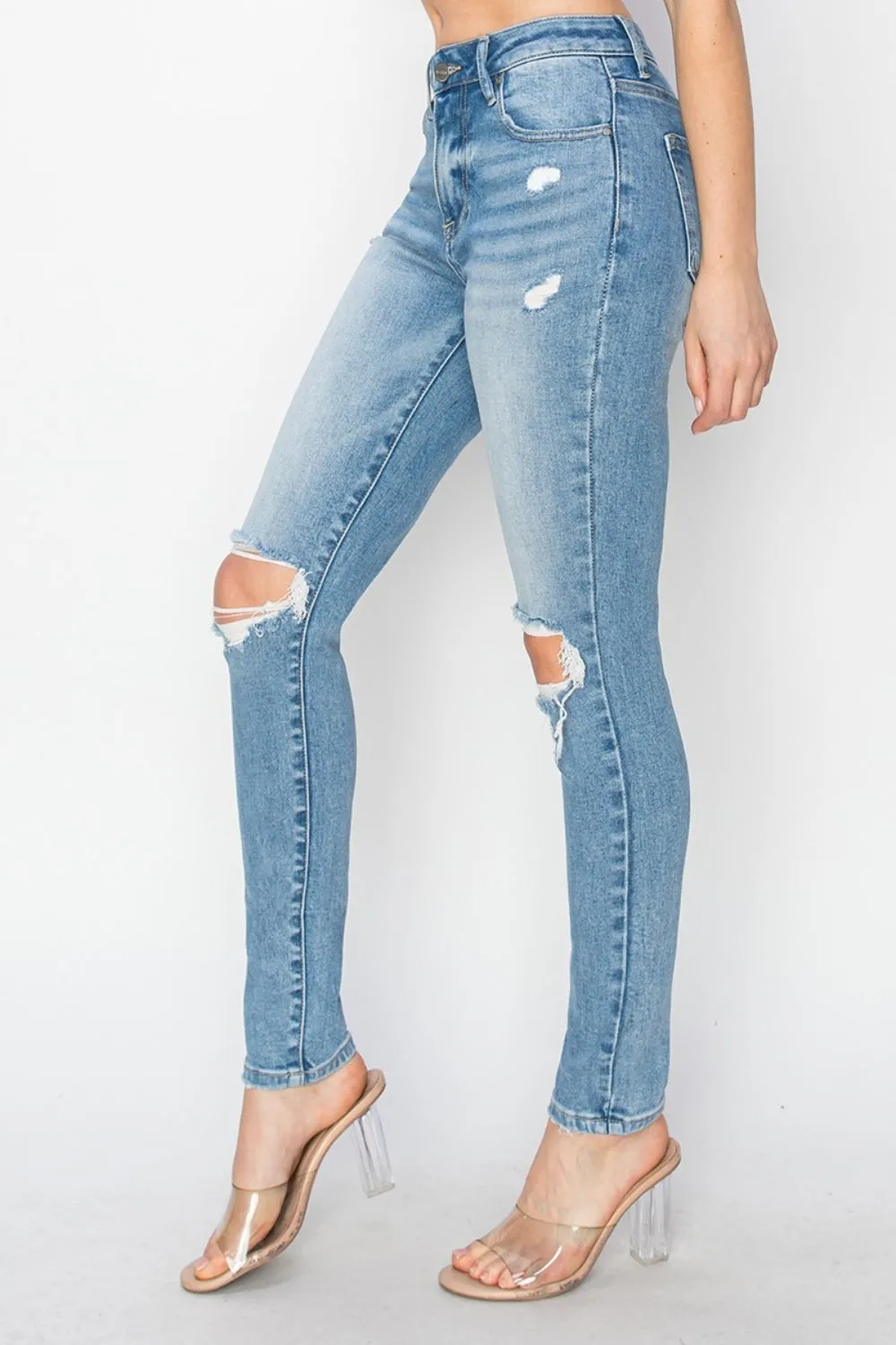 Edgy Elegance: Risen High Rise Knee Distressed Skinny Jeans