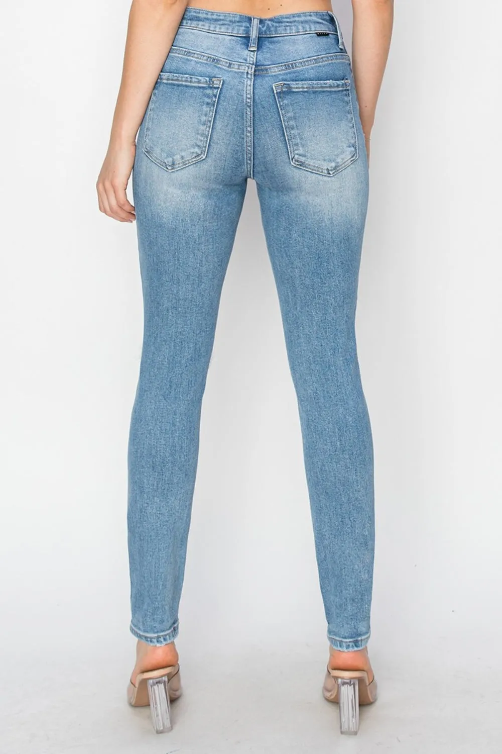 Edgy Elegance: Risen High Rise Knee Distressed Skinny Jeans