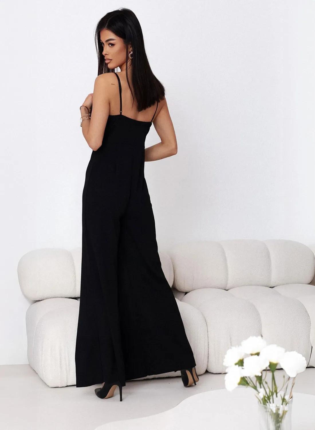 Elegant black jumpsuit with side slits on the legs
