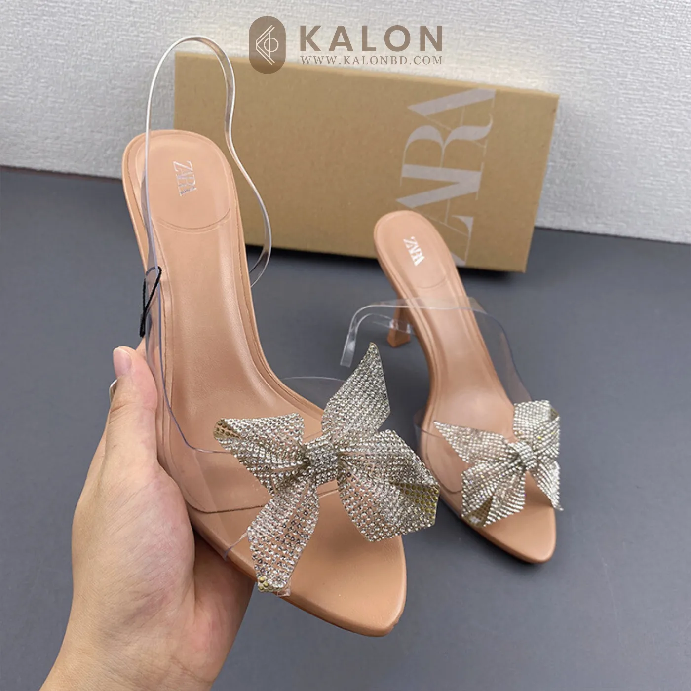 Rhinestone decorated bow heel