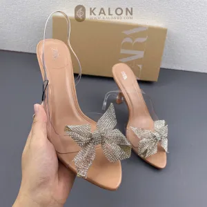 Rhinestone decorated bow heel