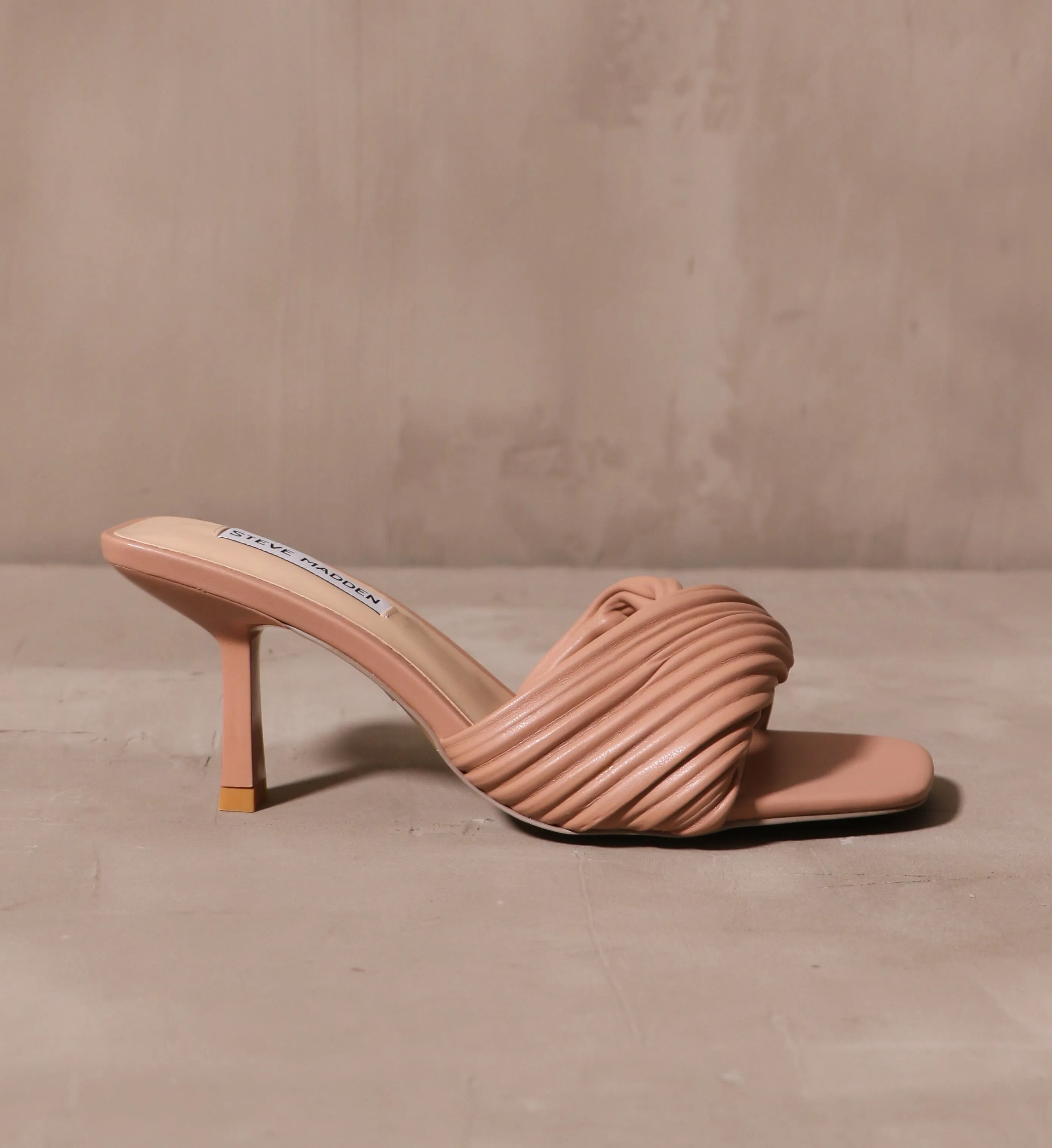 TWIST OF FATE HEEL