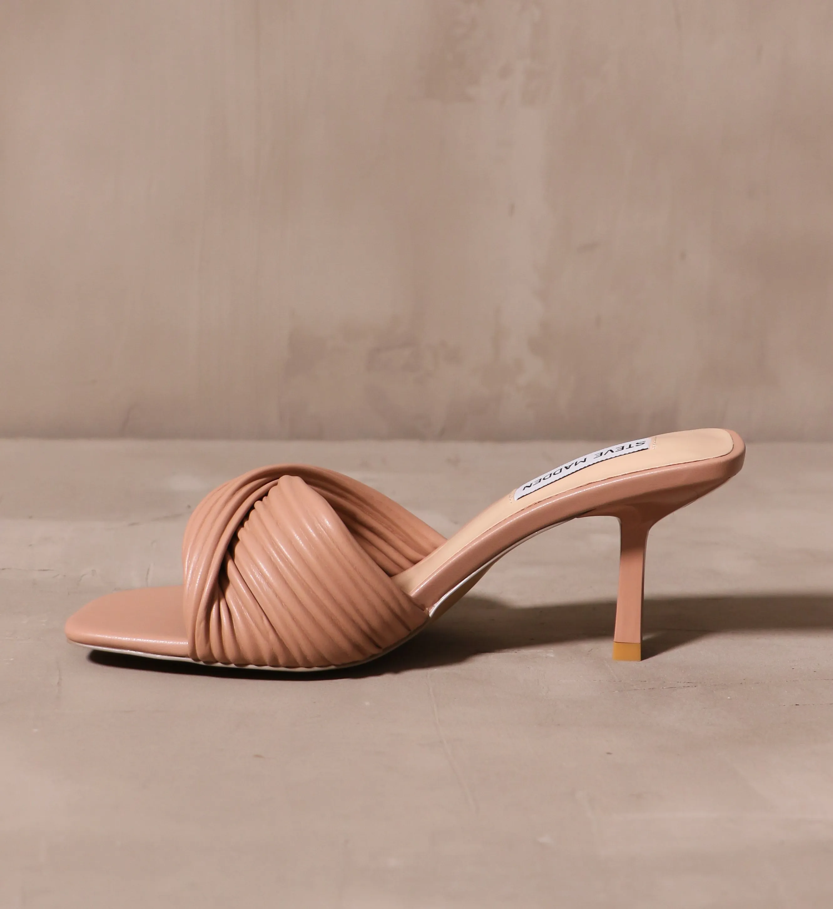 TWIST OF FATE HEEL
