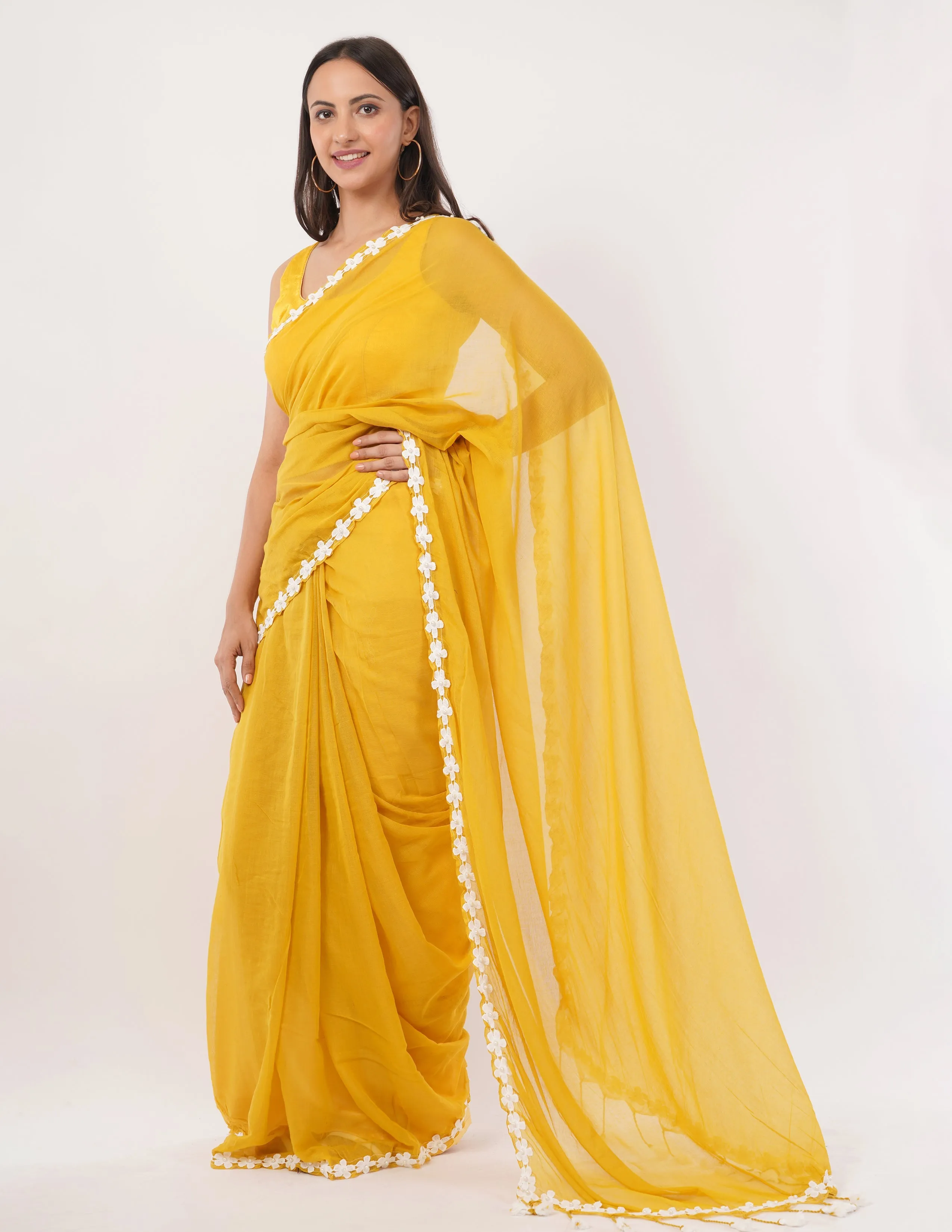 yellow while the lightweight mul cotton saree