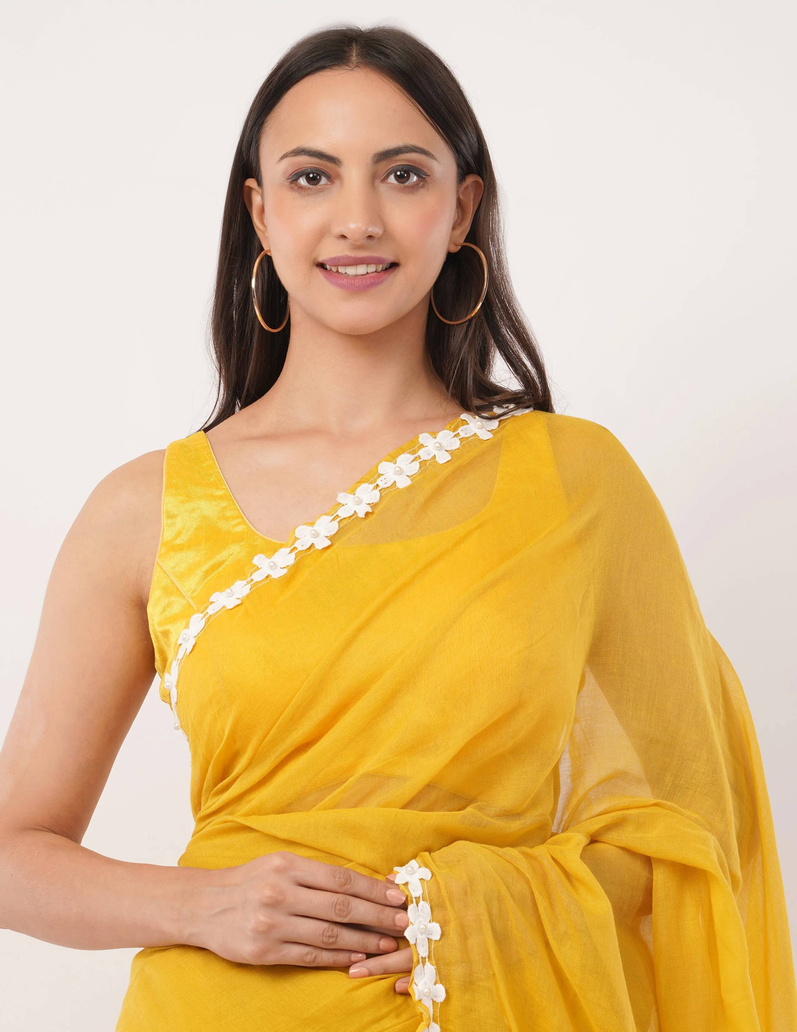 yellow while the lightweight mul cotton saree