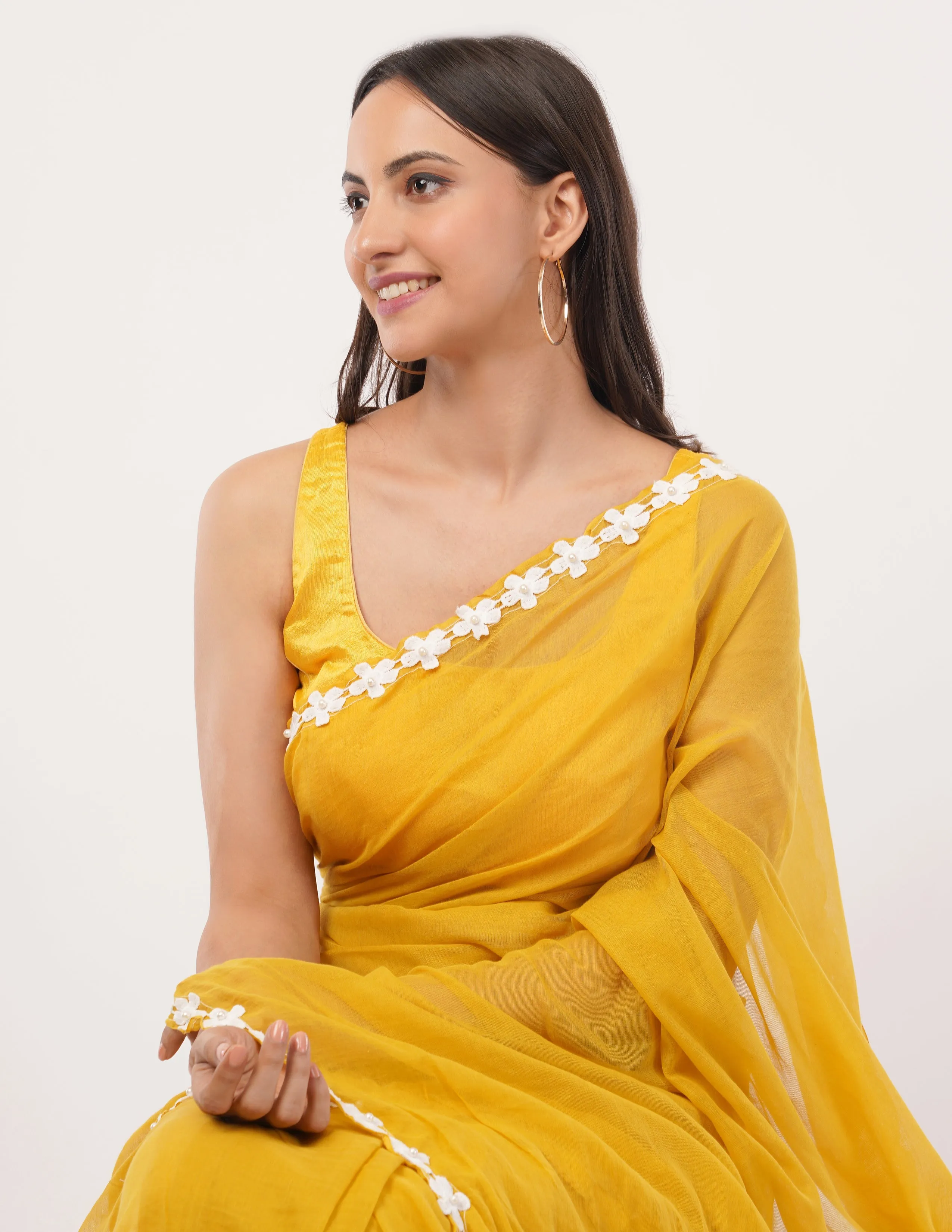 yellow while the lightweight mul cotton saree