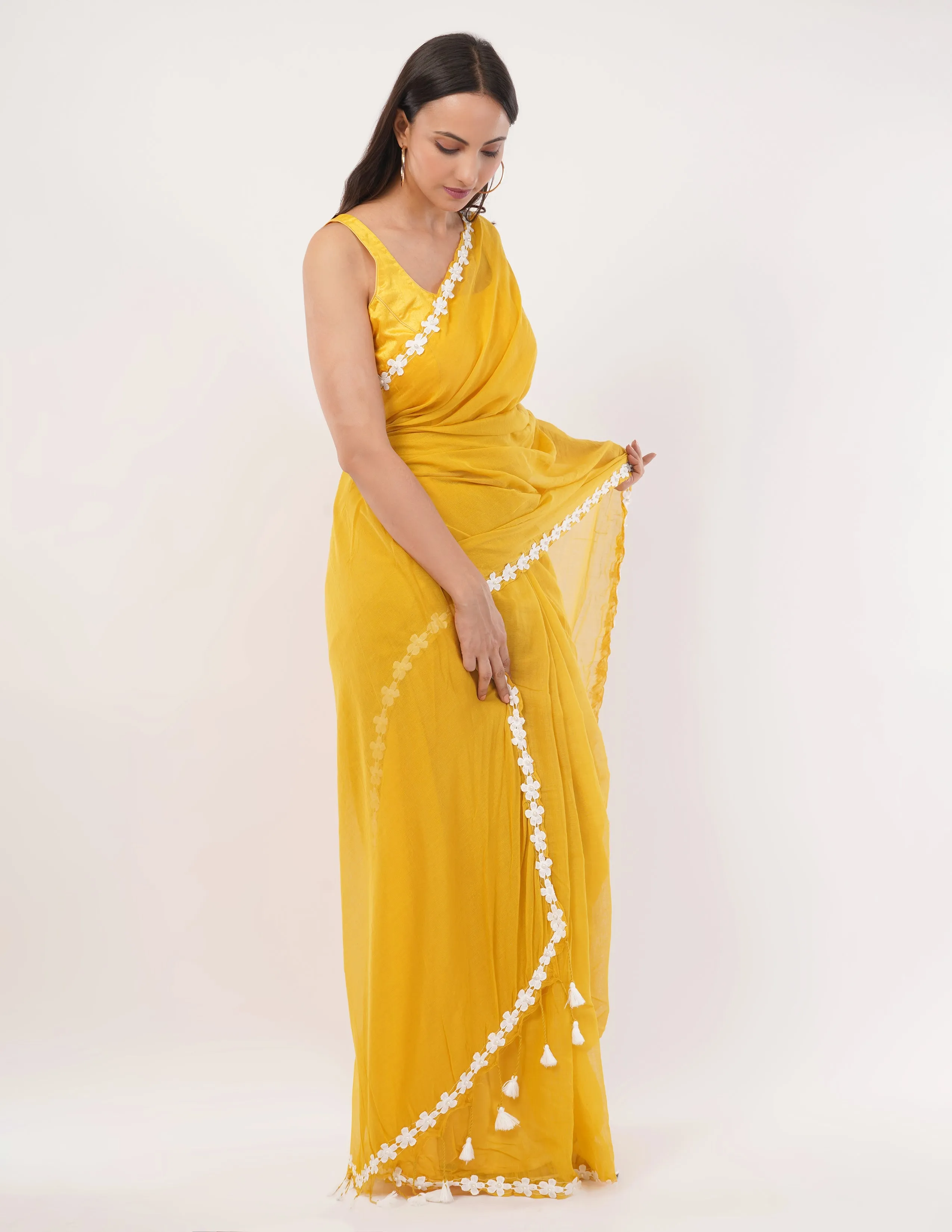 yellow while the lightweight mul cotton saree